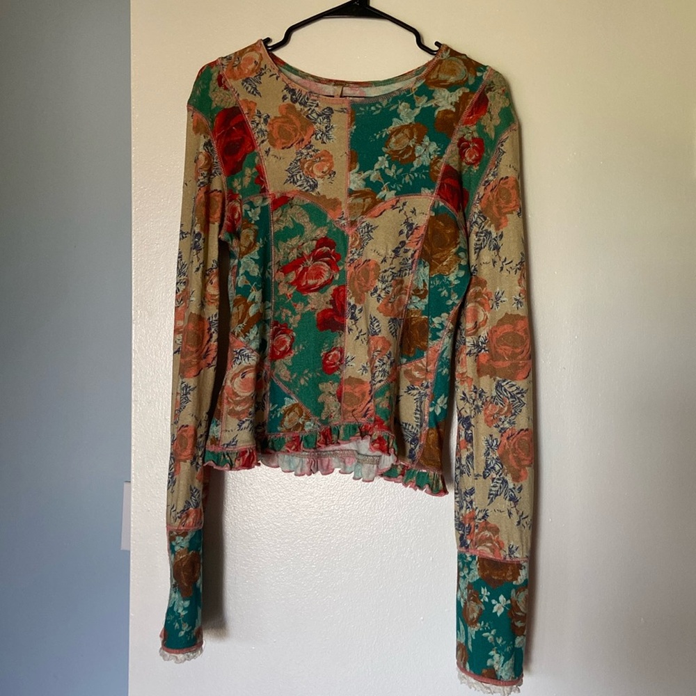 Free People ruffle bottom long sleeve top